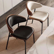 A pair of KY-005 bespoke dining chairs with rattan backrests and dark wood finish, available for bulk supply and wholesale dining chairs orders.
