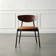 Puwabi X3041 Compass-Leg Contract Dining Chair with wooden frame and upholstered seat, shown from side view.