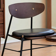 Puwabi X3041 Compass-Leg dining chair with wooden frame and upholstered seat, modern design, in a neutral fabric finish.