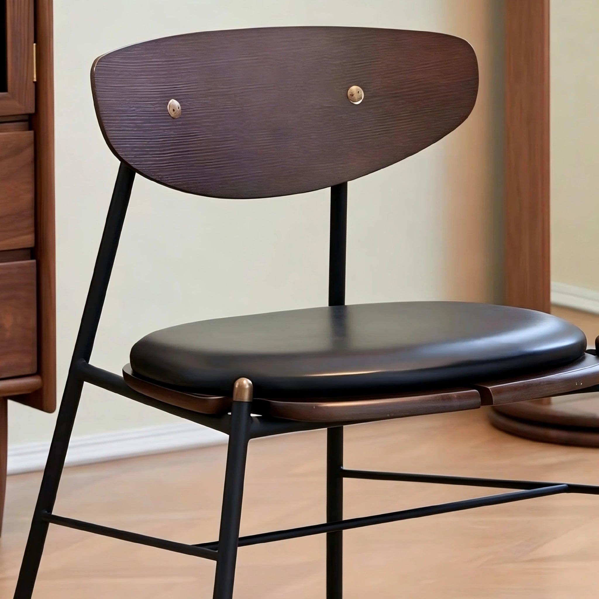 Puwabi X3041 Compass-Leg dining chair with wooden frame and upholstered seat, modern design, in a neutral fabric finish.