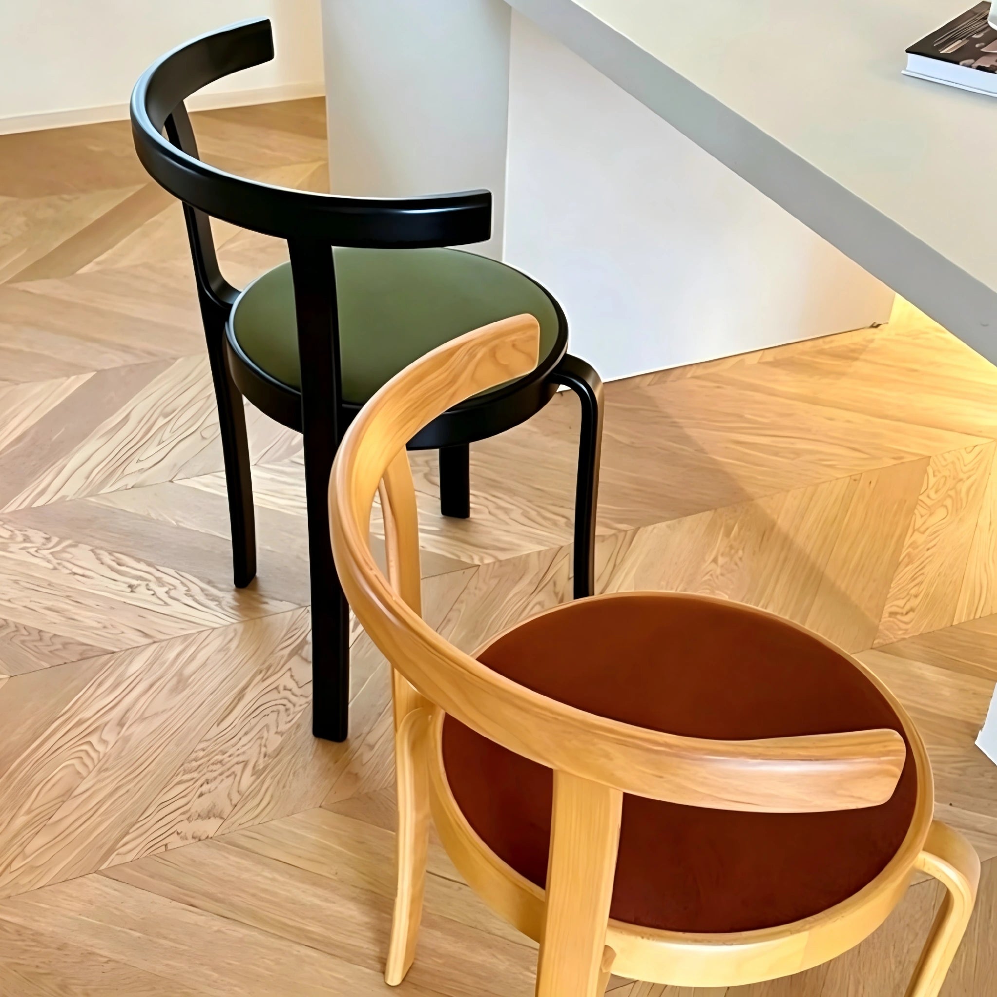 Puwabi X6226 continuous bentwood contract dining chair with sleek wooden frame, shown from side angle in natural wood finish