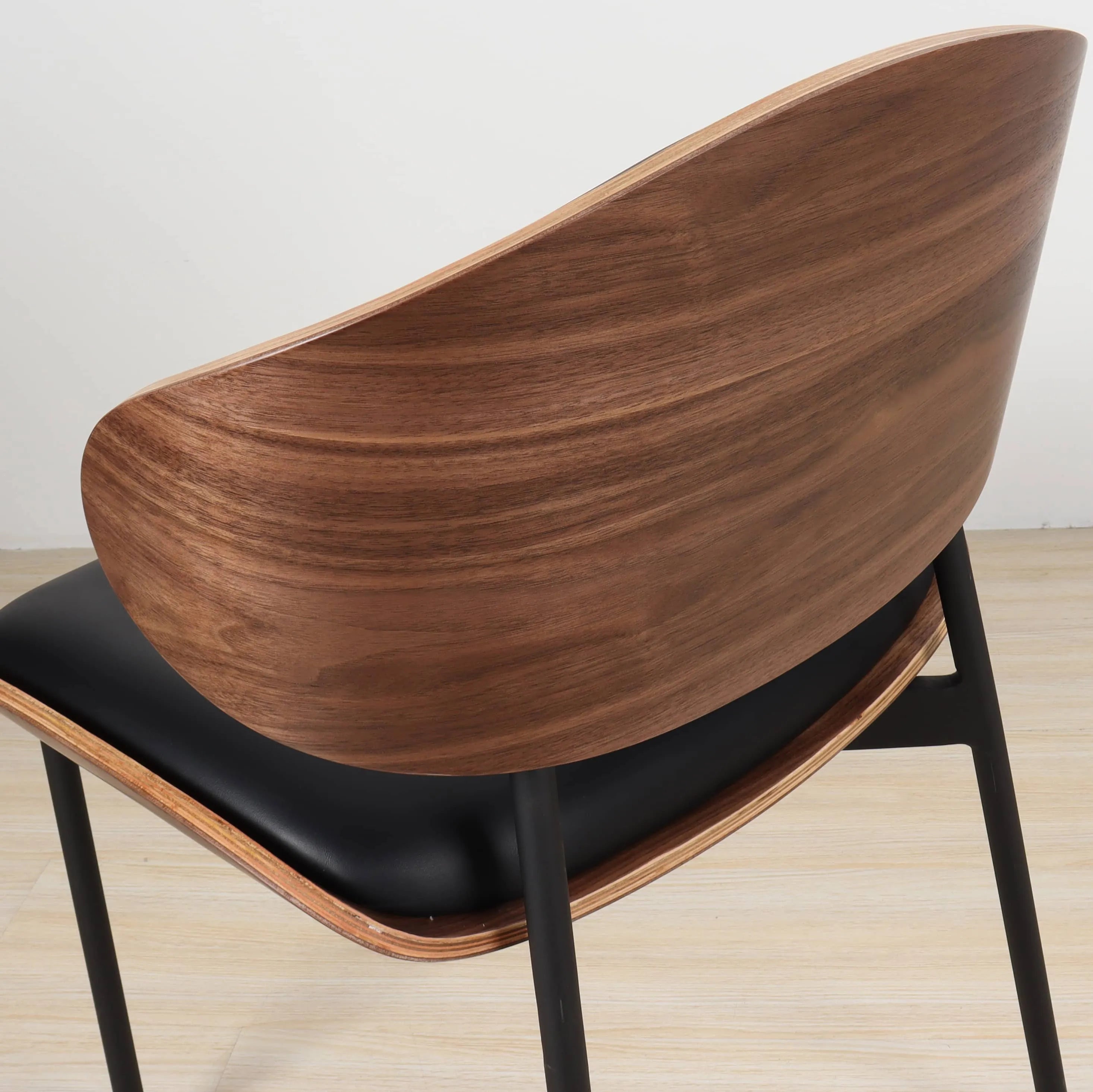 Puwabi Walnut Bentwood Contract Dining Chair with sleek curved design and wooden finish, ideal for modern dining spaces.