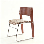 Puwabi X6210 architectural mixed-material dining chair with sleek design and sturdy frame, suitable for contract dining spaces.