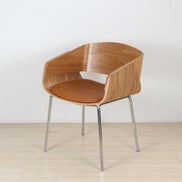 Puwabi X6057 mid-century bentwood dining chair with smooth curved wooden seat and tapered legs, natural finish.