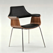 Puwabi X6119 sculptural bentwood contract dining armchair with curved wooden frame and upholstered seat, designed for contract use.