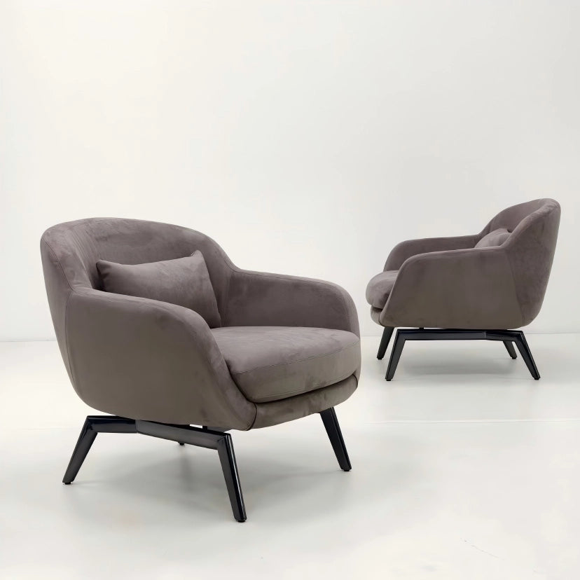 Two gray armchairs with black legs on a white background